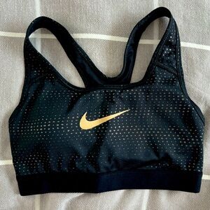 XS black and gold Nike sports bra